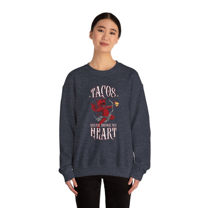 Tacos Never Broke my Heart "Evil Cupid" - Unisex Heavy Blend™ Crewneck Sweatshirt